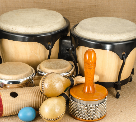Photograph image of a group of musical percussion instruments on a table